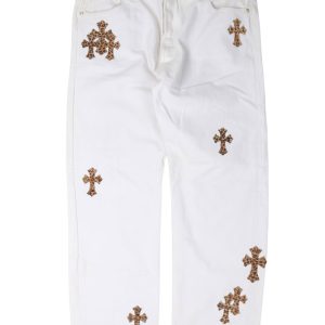 Vaqueros Levi's con parche de cruz de leopardo y corazones cromados